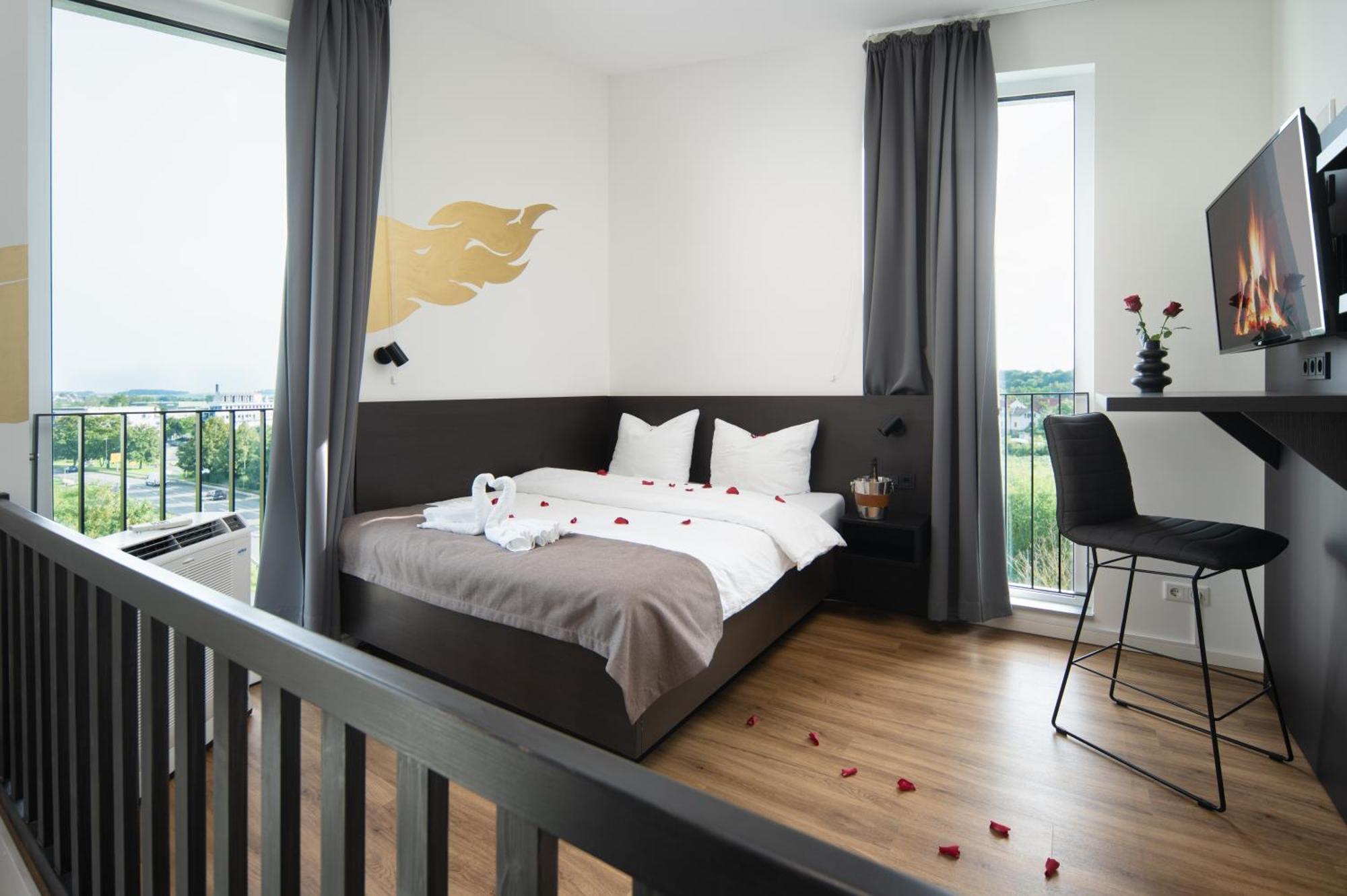 We Rooms Hotel Karben Bagian luar foto