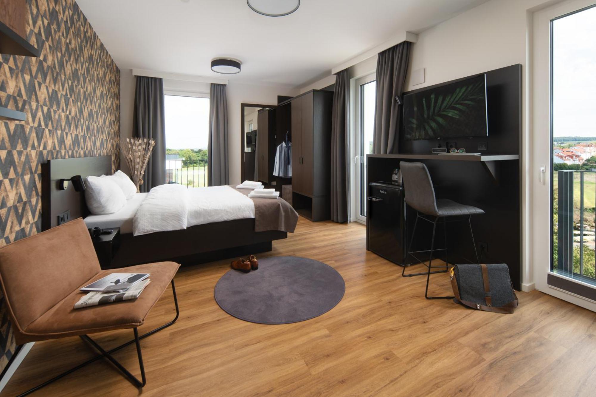 We Rooms Hotel Karben Bagian luar foto